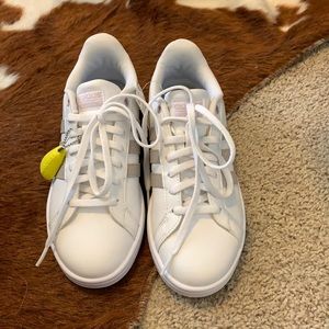 Adidas white and lavender sneakers.